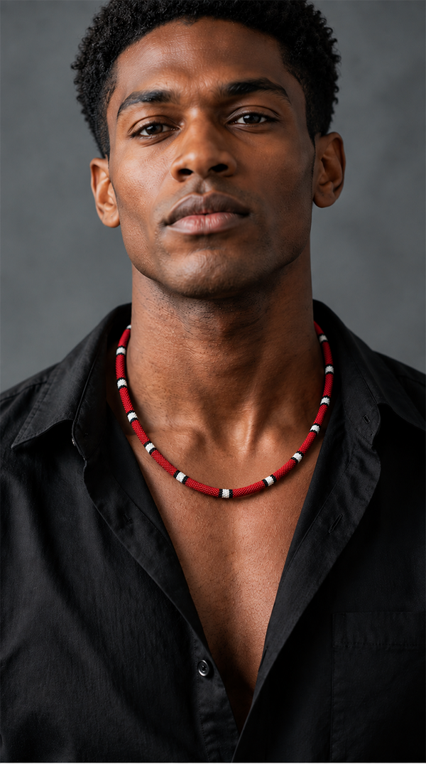 Man wearing a beaded necklace